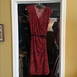 Women’s below the knee sleeveless faux wrap dress with side ruching